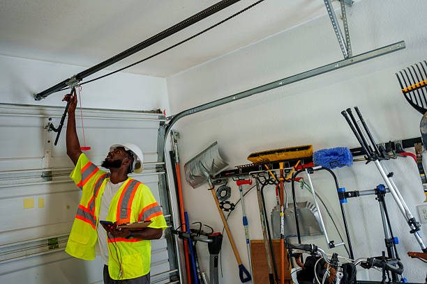 Professional Garage Door Cable Repair technician working in Mattapoisett Center, MA